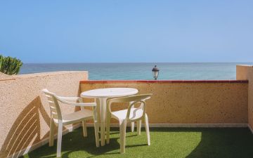 terraza habitacion doble oceant front sbh taro beach